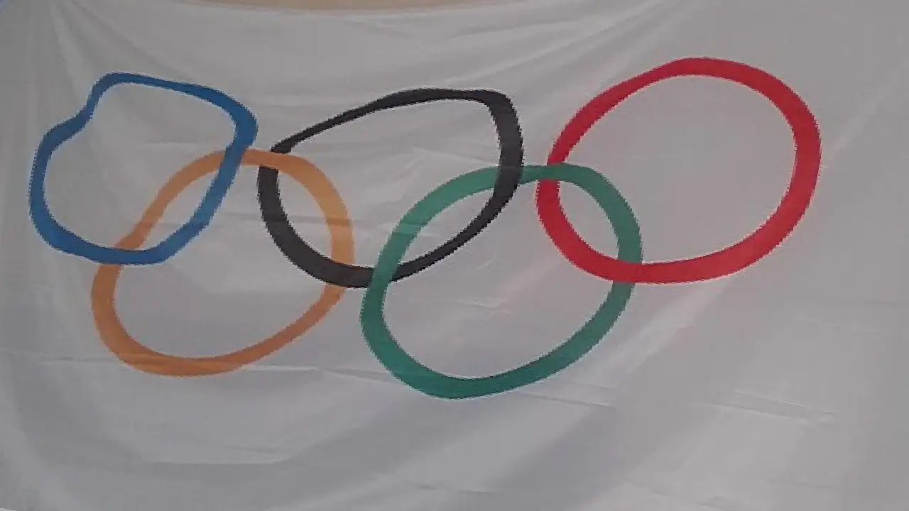 COI pruebas genéticas - bandera olimpica
